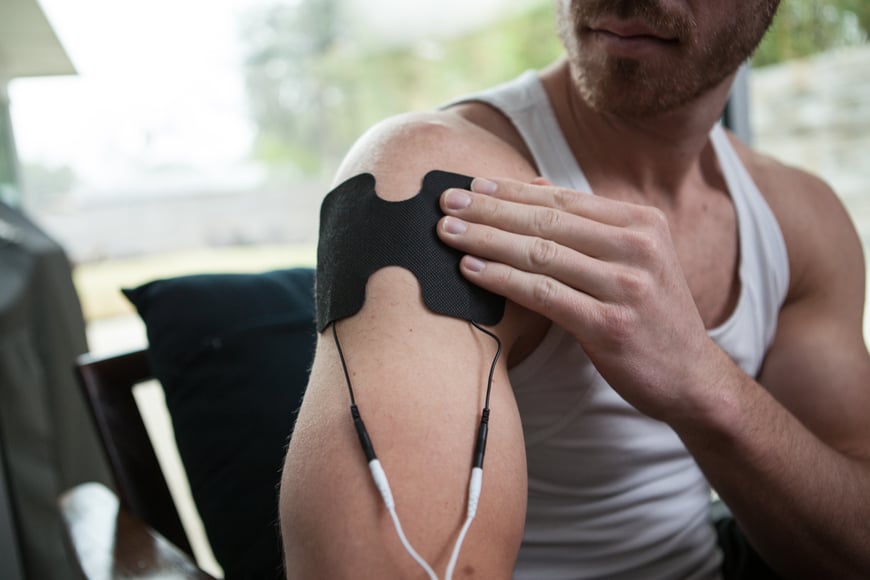 Treating tendonitis of the shoulder with TENS Unit